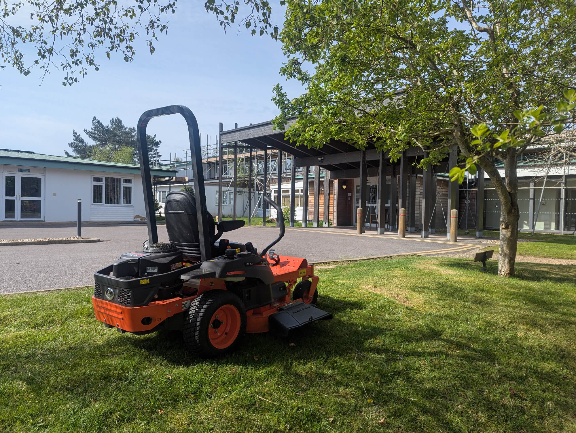 zero turn mower at a commercial property for Roff Co